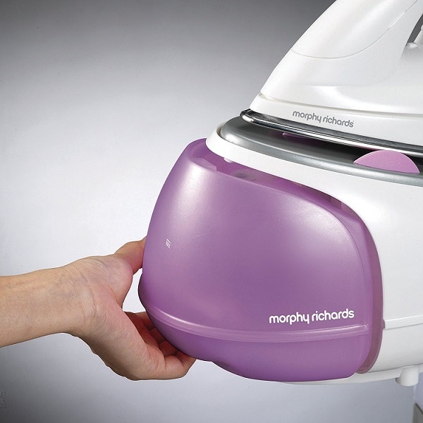 hand holding Morphy Richards 333020 jet steam generator